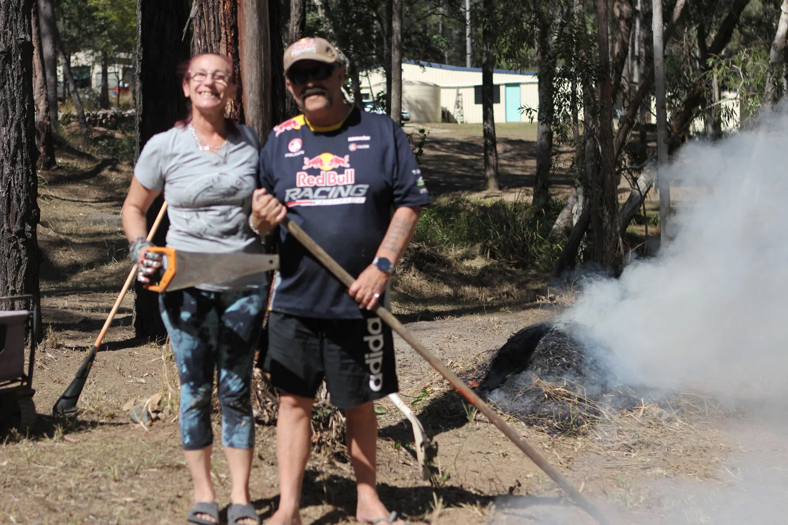 Verdells and Gary beside a controlled vegetation burn in Glenwood
