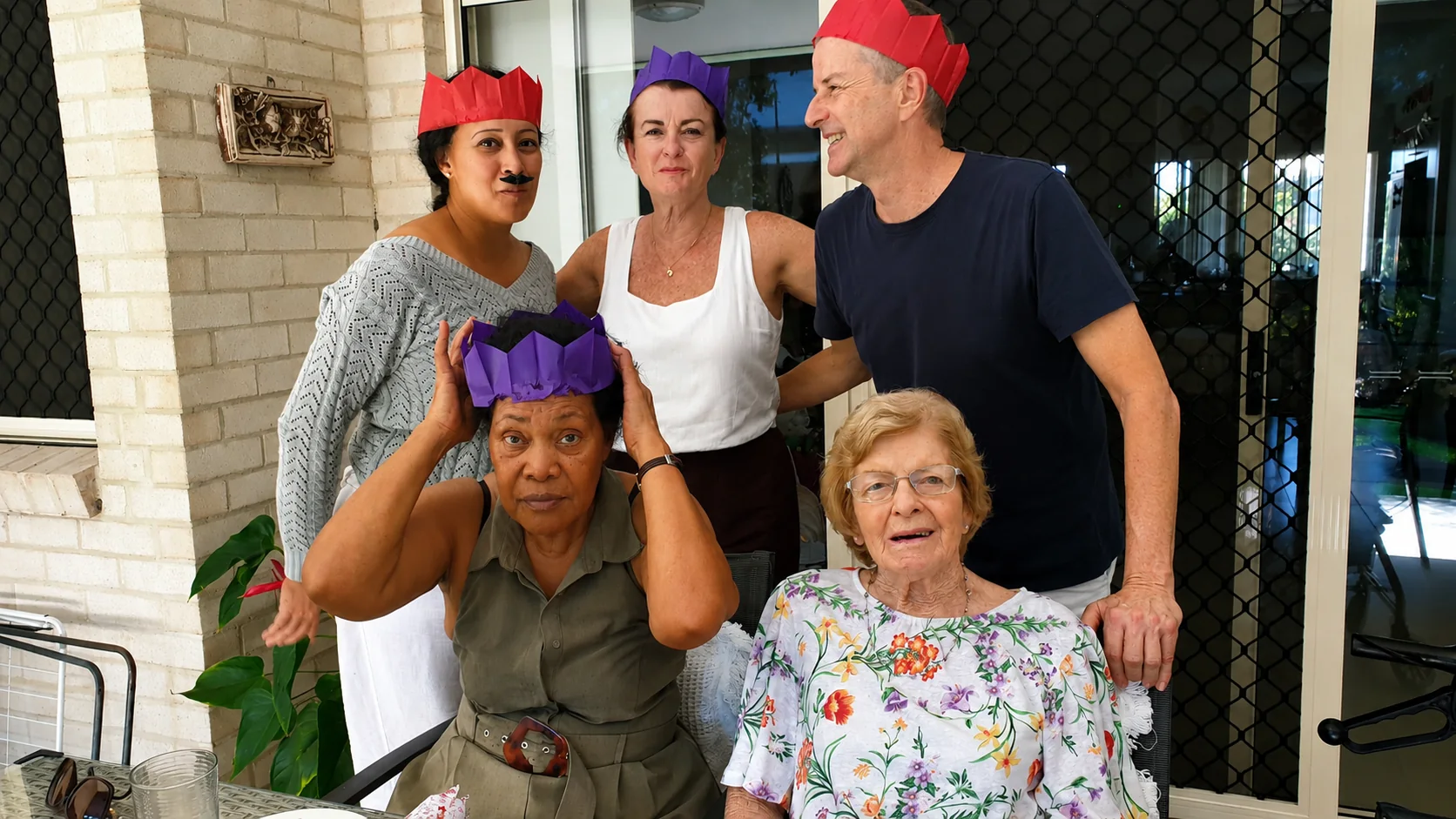 Friends and family enjoying a light-hearted social gathering